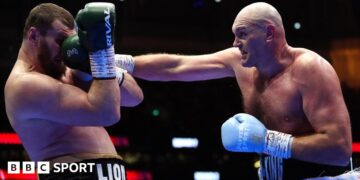Tyson Fury landing a punch on Arslanbek Makhmudov