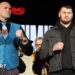 Tyson Fury and Arslanbek Makhmudov pose with their fists up for pictures