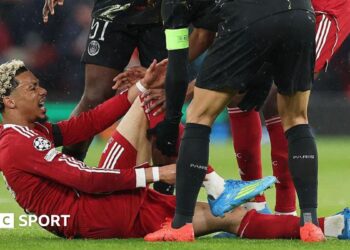 Hugo Ekitike looks in pain after suffering an injury