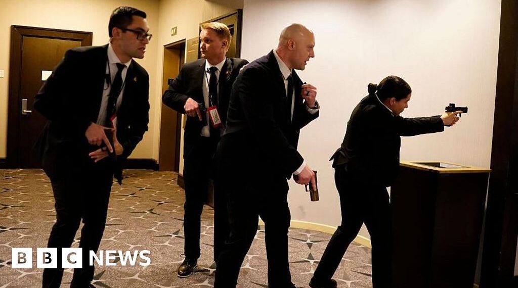 In pictures: Chaos as gunfire heard in Washington DC ballroom