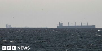 Iran says Strait of Hormuz is 'open' but tracking shows few ships moving