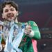 James Trafford holds the Carabao Cup trophy