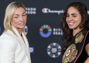 Lauren Price and Stephanie Pineiro smile at media day