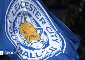 A flag with the Leicester City logo on it