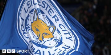 A flag with the Leicester City logo on it