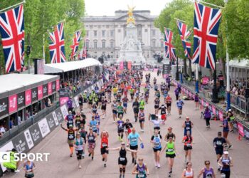 Runners make their way down The Mall to the London Marathon finish line