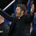 Man Utd manager Michael Carrick holds his arms out