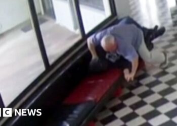 Moment gunman tackled by school principal