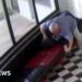 Moment gunman tackled by school principal