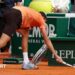 Daniil Medvedev smashes his racquet