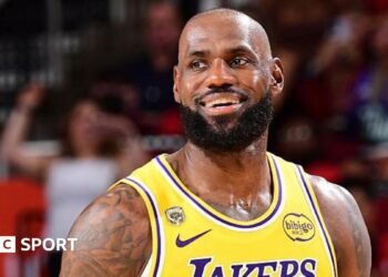 LeBron James smiles while playing for the Los Angeles Lakers against the Houston Rockets in game three of their 2026 NBA play-off series