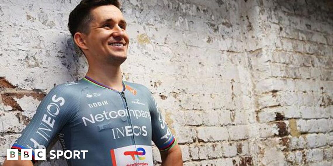 Michal Kwiatkowski models the new Netcompany-Ineos Cycling Team jersey