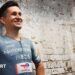 Michal Kwiatkowski models the new Netcompany-Ineos Cycling Team jersey