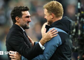 Yasir Al-Rumayyan greets Eddie Howe after Newcastle United qualify for the Champions League following a goalless draw against Leicester City at St James' Park on 22 May, 2023