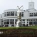 The Claret Jug photographed on top of a bunker in front of the Royal Birkdale clubhouse