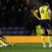 Oxford players Will Lankshear and Michal Helik look disconsolate following their defeat by Wrexham