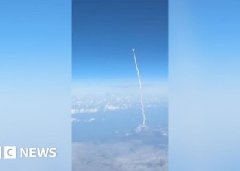 Passengers watch Artemis II blast off from commercial plane