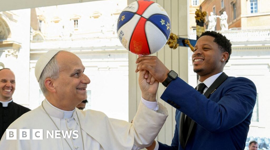 Pope Leo XIV spins basketball on his finger, with help from Harlem Globetrotters