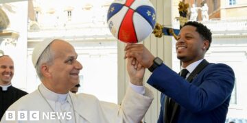 Pope Leo XIV spins basketball on his finger, with help from Harlem Globetrotters