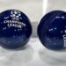 Two dark blue draw balls with the Uefa Champions League logo