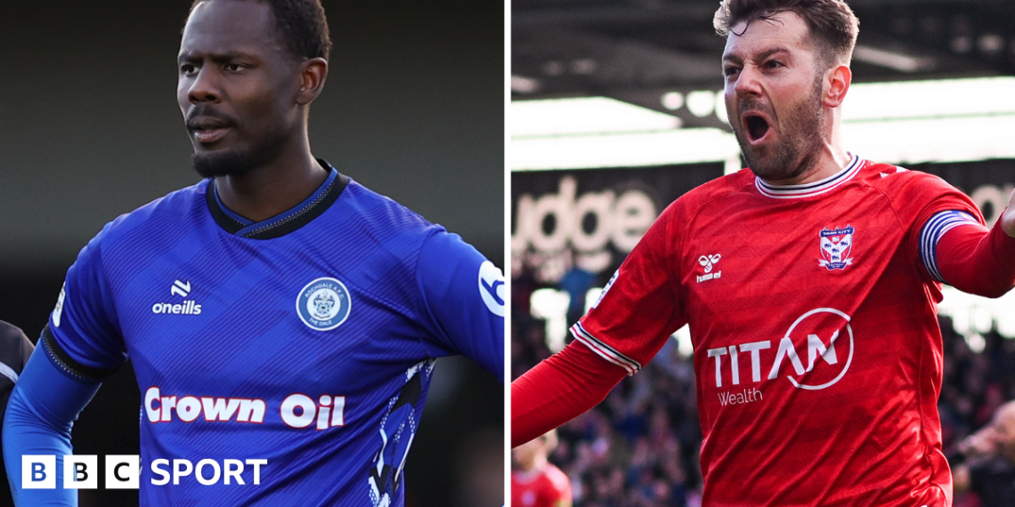 Rochdale striker Emmanuel Dieseruvwe (left) in his side's blue home shirt and York City's Ollie Pearce (right) in his team's red home jersey
