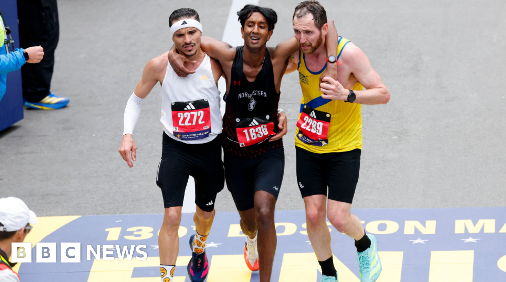 Runners help exhausted man finish Boston Marathon