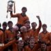 The statue of Jim McLean holding the 1983 Premier Division trophy, which was erected outside Tannadice in 2021