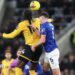 Everton's Michael Keane pulls the hair of Wolves' Tolu Arokodare