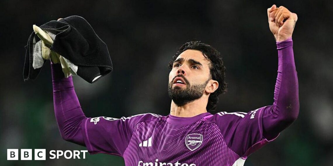 David Raya celebrates after Arsenal's 1-0 win at Sporting in the Champions League