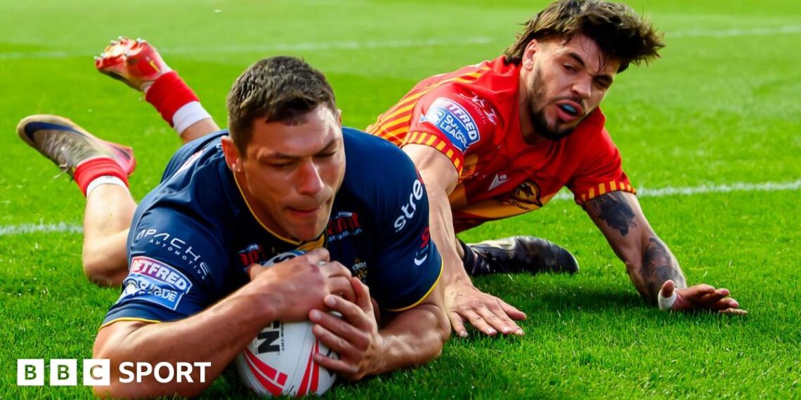 Ryan Hall dives in to score a try for Leeds Rhinos
