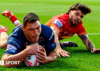 Ryan Hall dives in to score a try for Leeds Rhinos