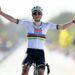 Tadej Pogacar holds his hands out wide as he celebrates winning the 2026 Tour of Flanders