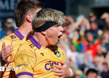 Henry Pollock celebrates a try