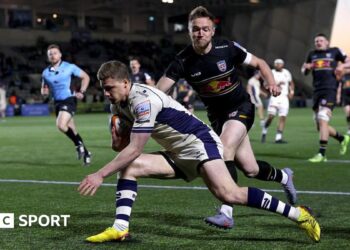 Noah Heward about to touch down to score Bristol's fourth try as a Newcastle player tries to get near him