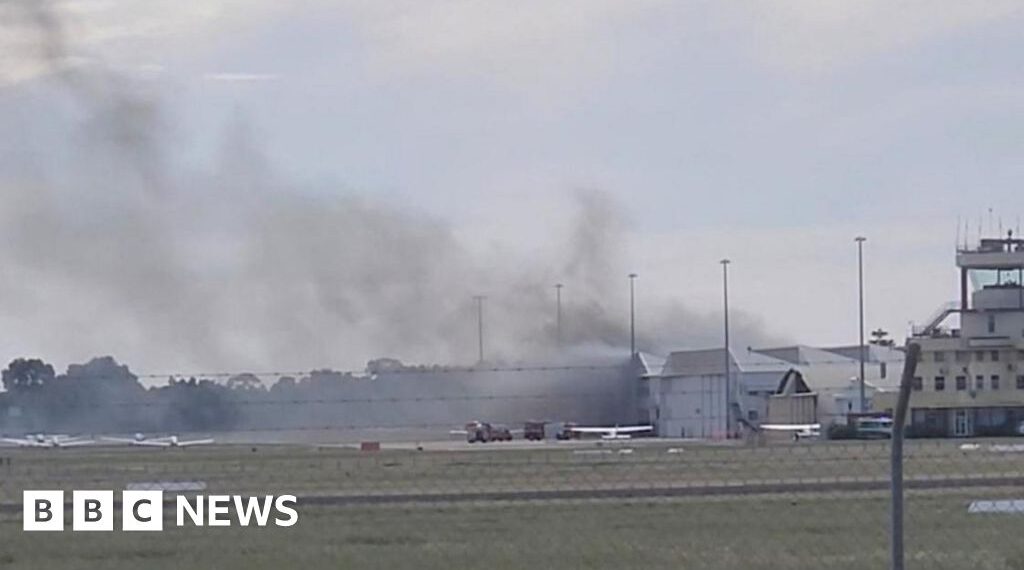 Two dead after small plane crashes into Australia airport hangar