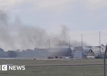 Two dead after small plane crashes into Australia airport hangar