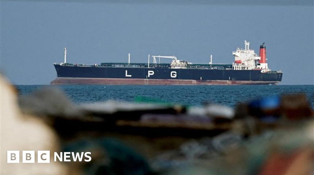 UK says Iran holding world economy 'hostage' with Hormuz attacks