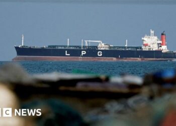 UK says Iran holding world economy 'hostage' with Hormuz attacks