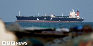 UK says Iran holding world economy 'hostage' with Hormuz attacks