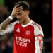 Ben White reacts with his hand on his head to Arsenal's loss against Southampton