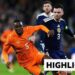 Andy Robertson battles with Wilfried Singo