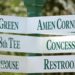 A sign at Augusta National Golf Club showing directions to Amen Corner, the 18th tee, concessions, the clubhouse and restrooms
