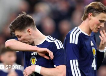 Scotland's Kieran Tierney and Scott McTominay look dejected