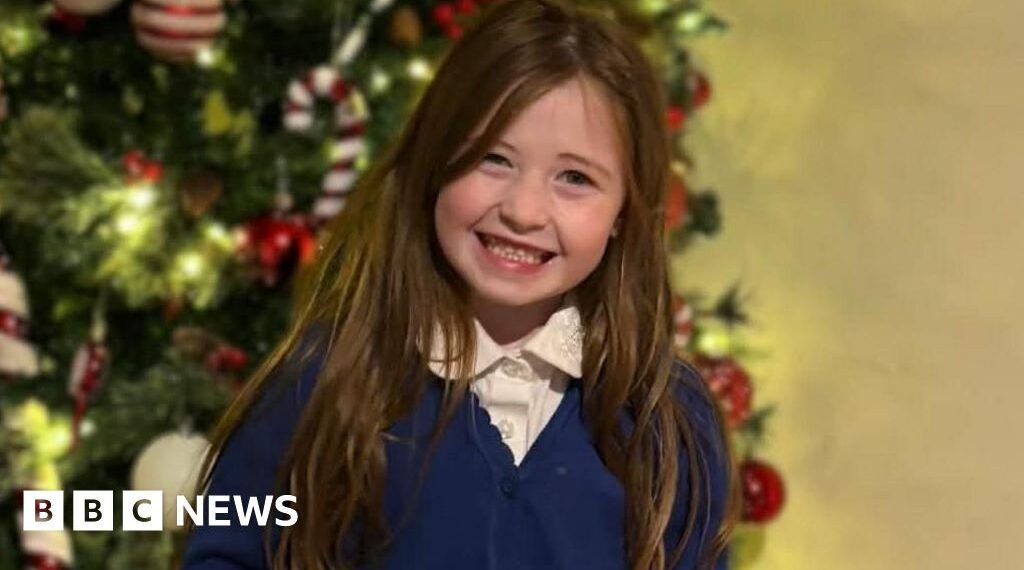 Woman arrested over death of girl found in pond