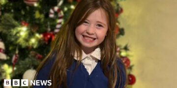 Woman arrested over death of girl found in pond
