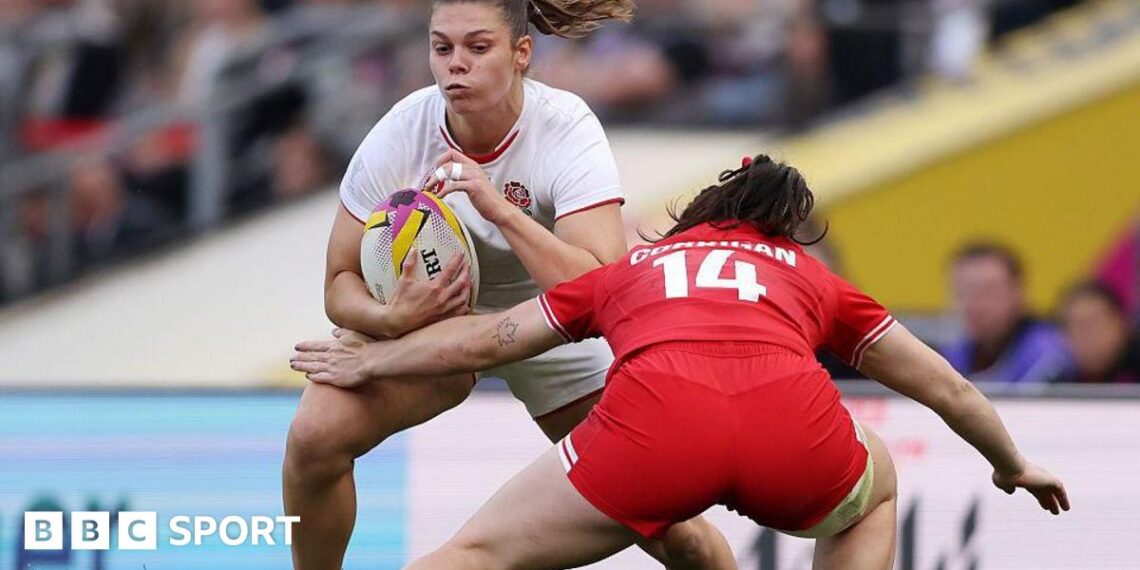 Helena Rowland carries the ball