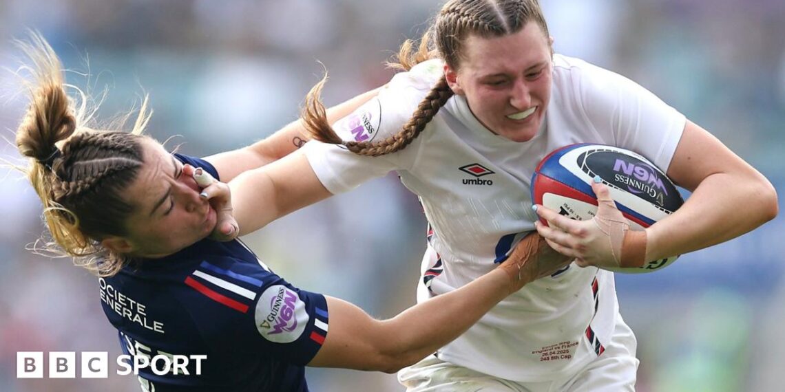 England full-back Emma Sing hands off France's Joanna Grisez
