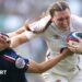 England full-back Emma Sing hands off France's Joanna Grisez
