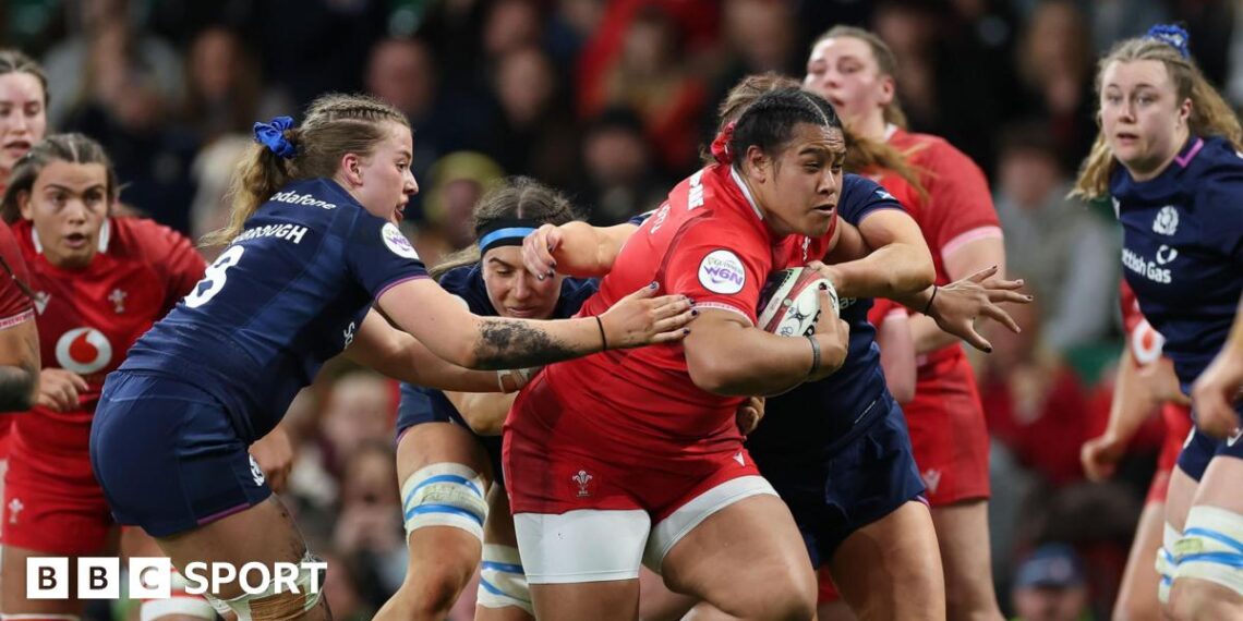 Sisilia Tuipulotu carries the ball for Wales