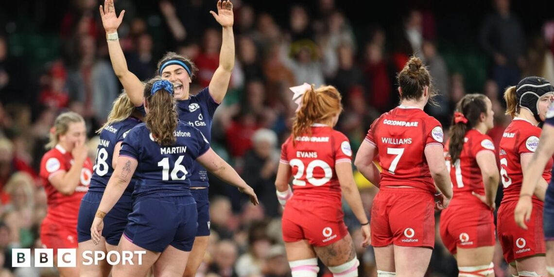 Scotland players celebrate victory over Wales in Cardiff